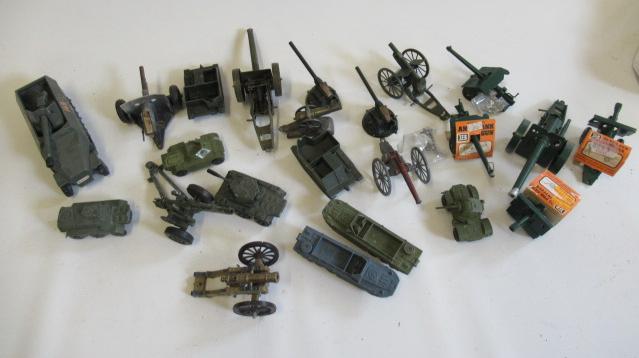 Diecast military vehicles including field guns Image