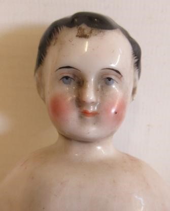 A china shoulder head doll Image
