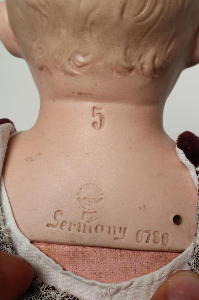 A Gebruder Heubach bisque shoulder head character boy doll Image
