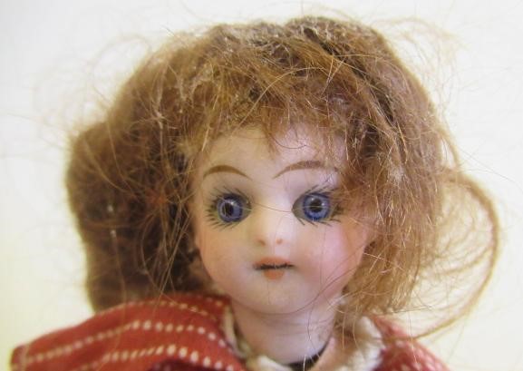 A possible Kammer & Reinhardt bisque socket head dolls house doll Image