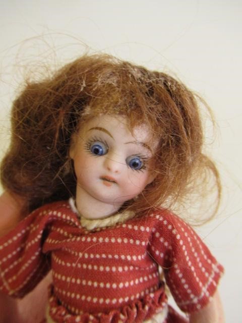 A possible Kammer & Reinhardt bisque socket head dolls house doll Image
