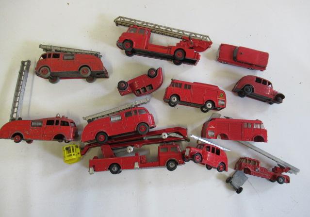 Eleven playworn fire engine models by Corgi Image