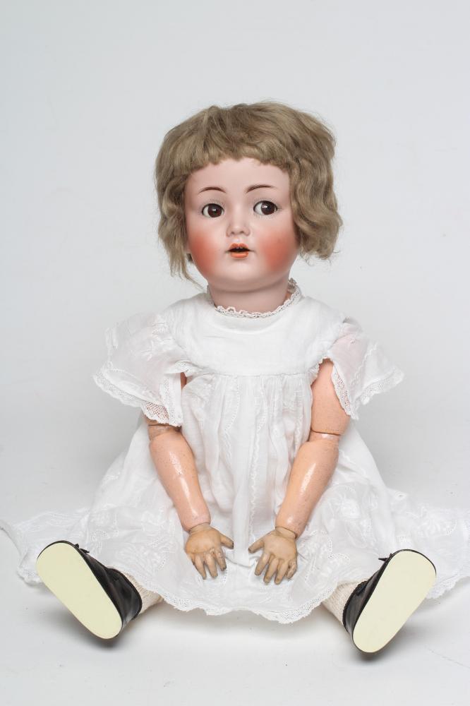 A Kammer & Reinhardt bisque socket head flirty doll Image