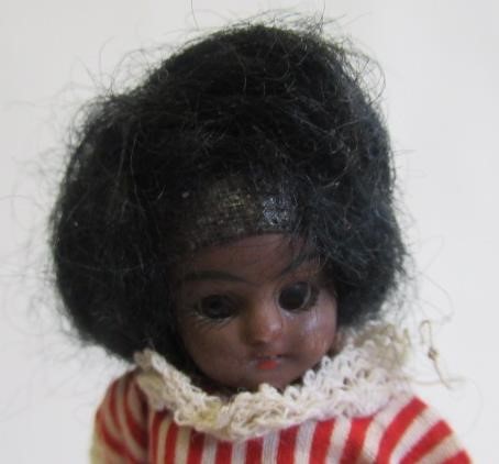 A possible Kammer & Reinhardt bisque socket head dolls house mulatto doll Image