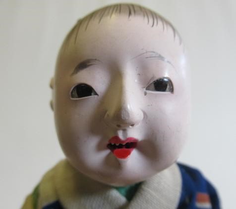 A pair of boxed oriental Moschemon dolls Image