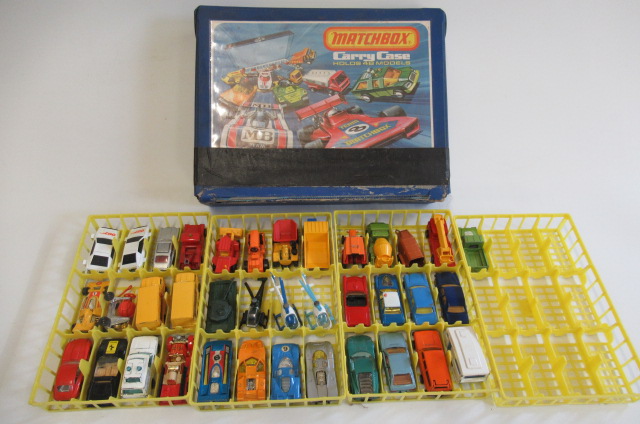 Matchbox Carry Case with plastic trays and thirty five Matchbox vehicles from the 1980's Image