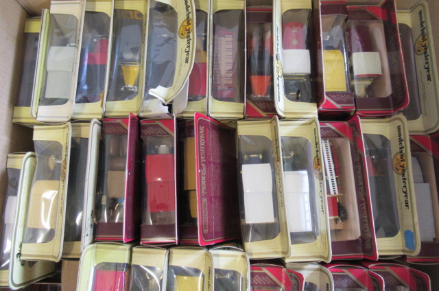 Thirty Matchbox models of Yesteryear including cars Image