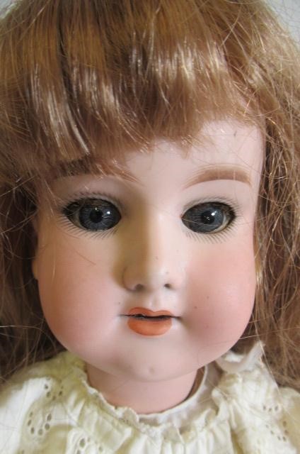 An Armand Marseille bisque socket head doll Image