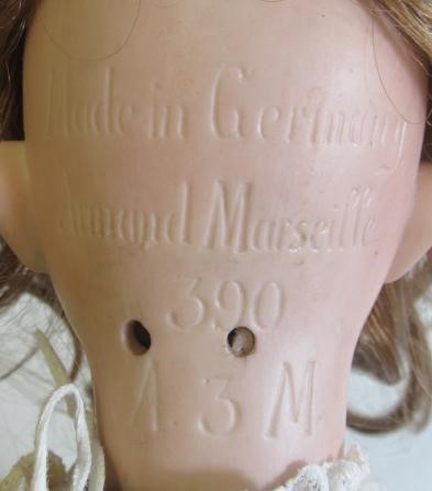 An Armand Marseille bisque socket head doll Image