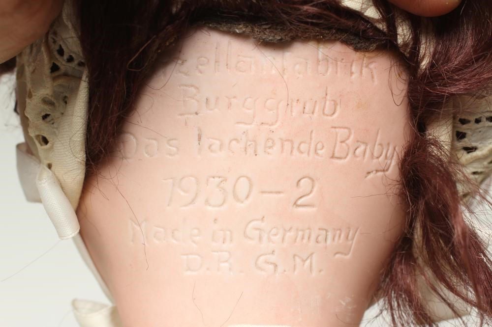 A Porzellanfabrik Burggrab "Das lachende Baby" bisque socket head character doll Image