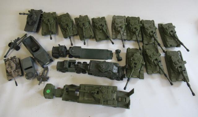 Playworn army vehicles including tanks Image