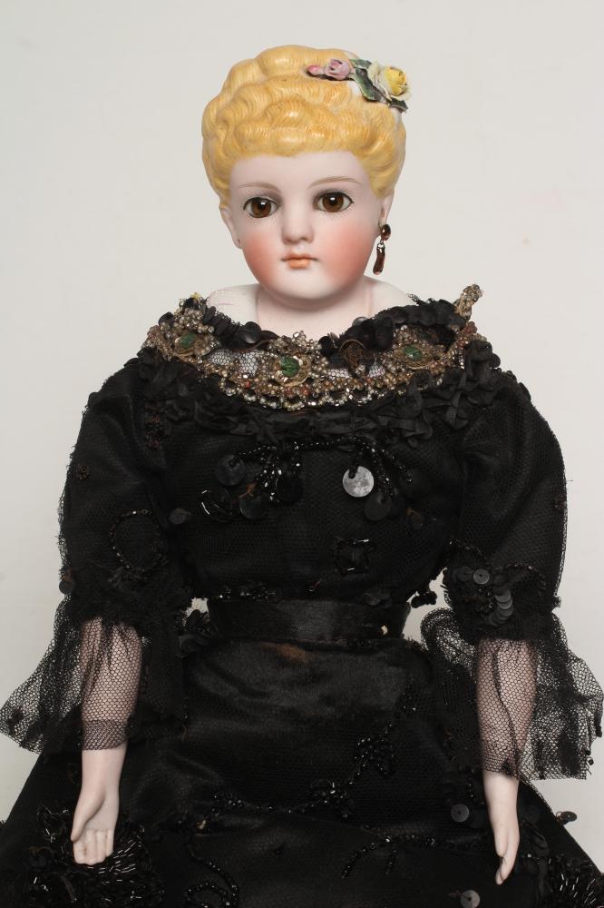 An early Kling bisque shoulder head doll Image