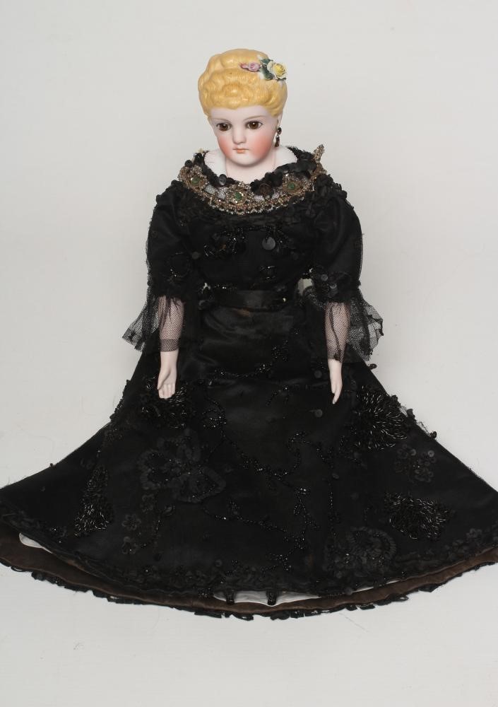 An early Kling bisque shoulder head doll Image