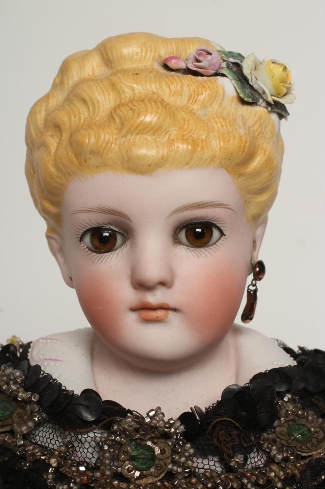 An early Kling bisque shoulder head doll Image