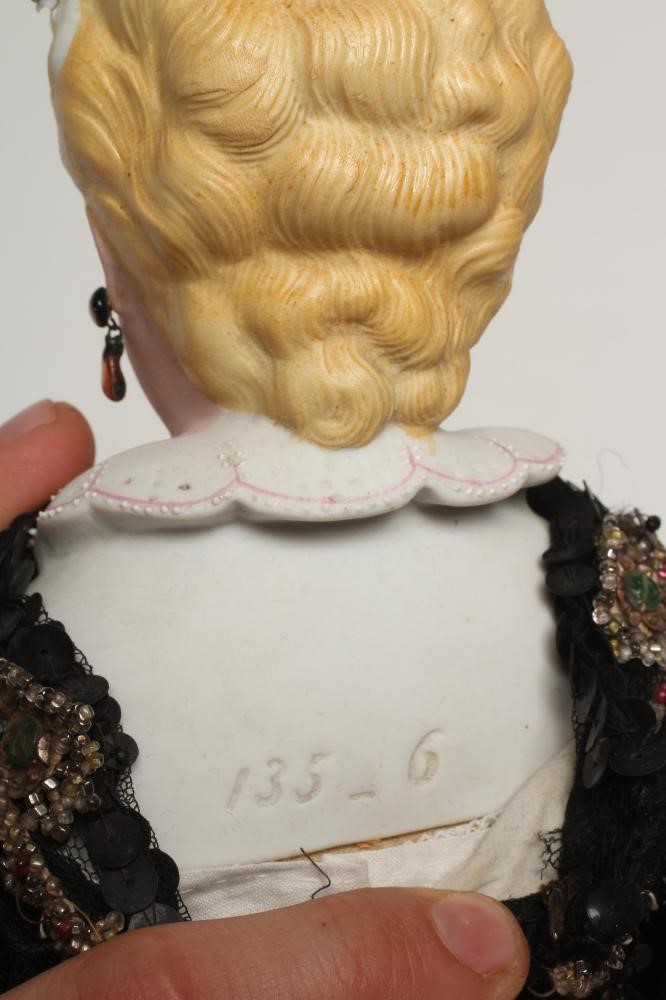 An early Kling bisque shoulder head doll Image