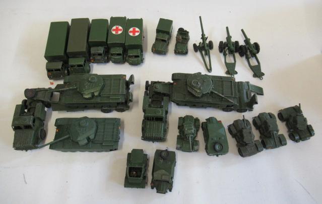 Twenty four Dinky military vehicles including tank transporters and tanks Image