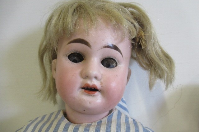 A Armand Marseille bisque socket head doll Image