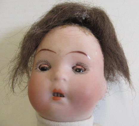 A Armand Marseille bisque socket head doll Image