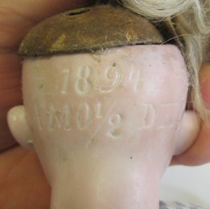 A Armand Marseille bisque socket head doll Image