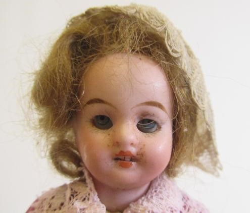 Two bisque head dolls Image