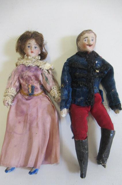 Two bisque shoulder head dolls house dolls Image