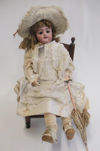 A Simon & Halbig bisque socket head doll Image