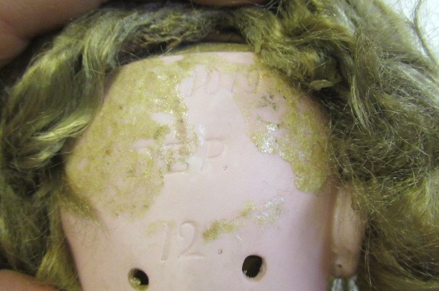 A Simon & Halbig bisque socket head doll Image