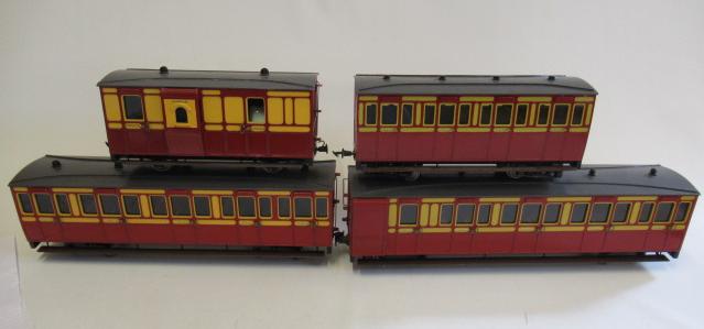 Four well made wooden 45mm narrow gauge coaches finished in red/yellow Image