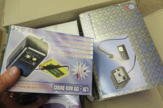 A quantity of railway paints model making tools including knife Image