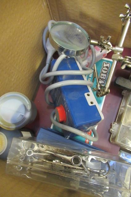 A quantity of railway paints model making tools including knife Image