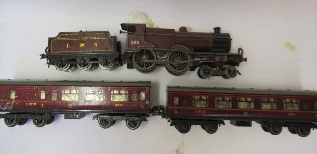 Hornby clockwork L.M.S. Compound Locomotive and two No 2 L.M.S. coaches Image