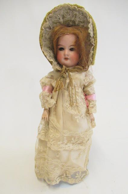 An Armand Marseille bisque socket head doll Image