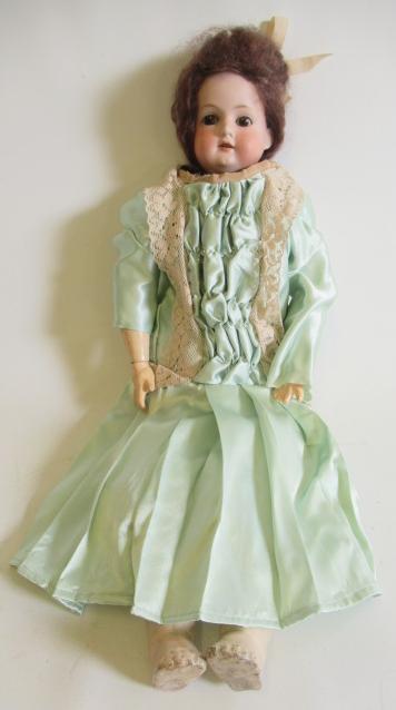 An Armand Marseille bisque shoulder head doll Image