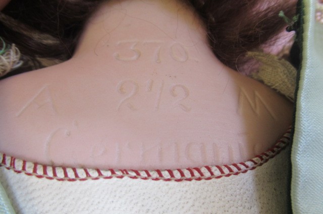 An Armand Marseille bisque shoulder head doll Image