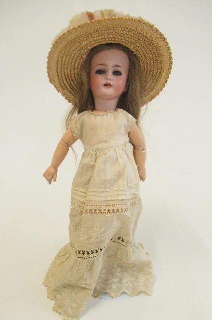 A Simon & Halbig bisque socket head doll Image
