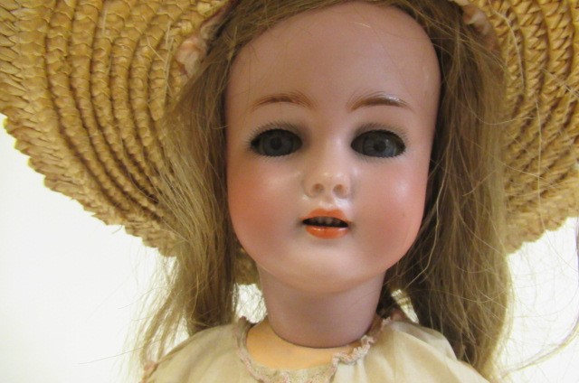 A Simon & Halbig bisque socket head doll Image