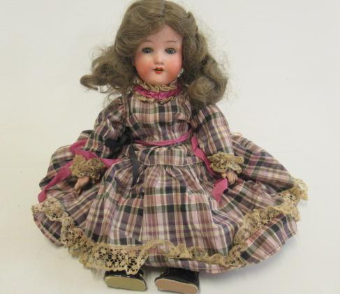 An Armand Marseille bisque socket head doll Image