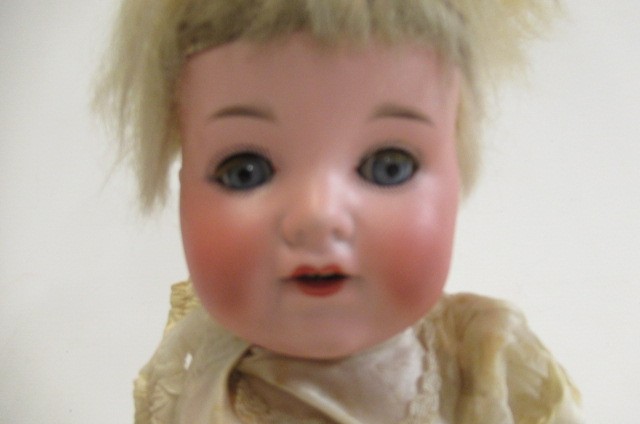 An Armand Marseille bisque socket head doll Image