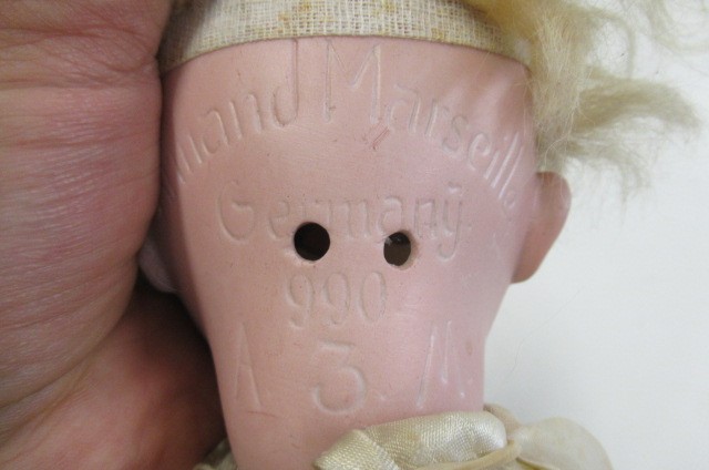 An Armand Marseille bisque socket head doll Image