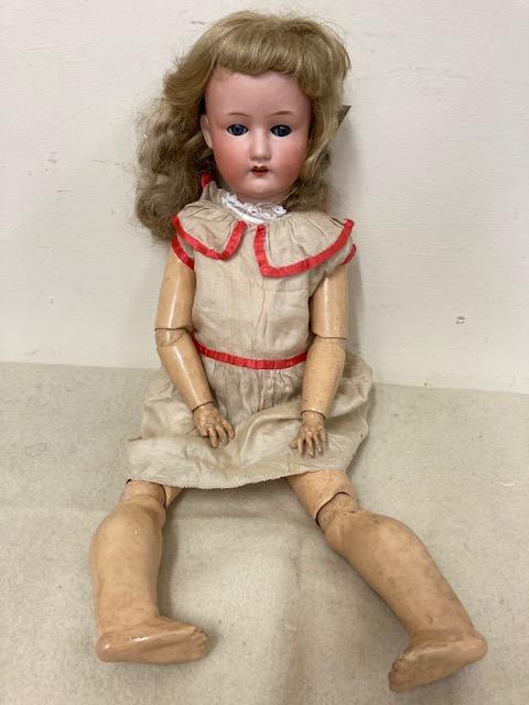 A Heubach Koppelsdorf bisque socket head doll Image