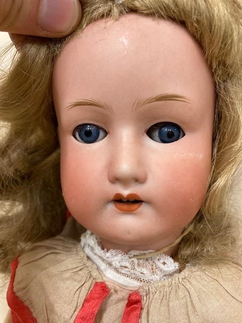 A Heubach Koppelsdorf bisque socket head doll Image