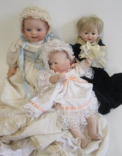 Three bisque head dolls Image