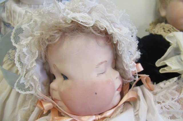 Three bisque head dolls Image