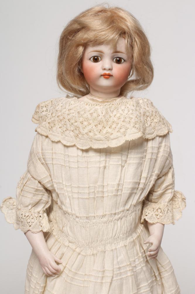 A Simon & Halbig bisque socket head doll Image