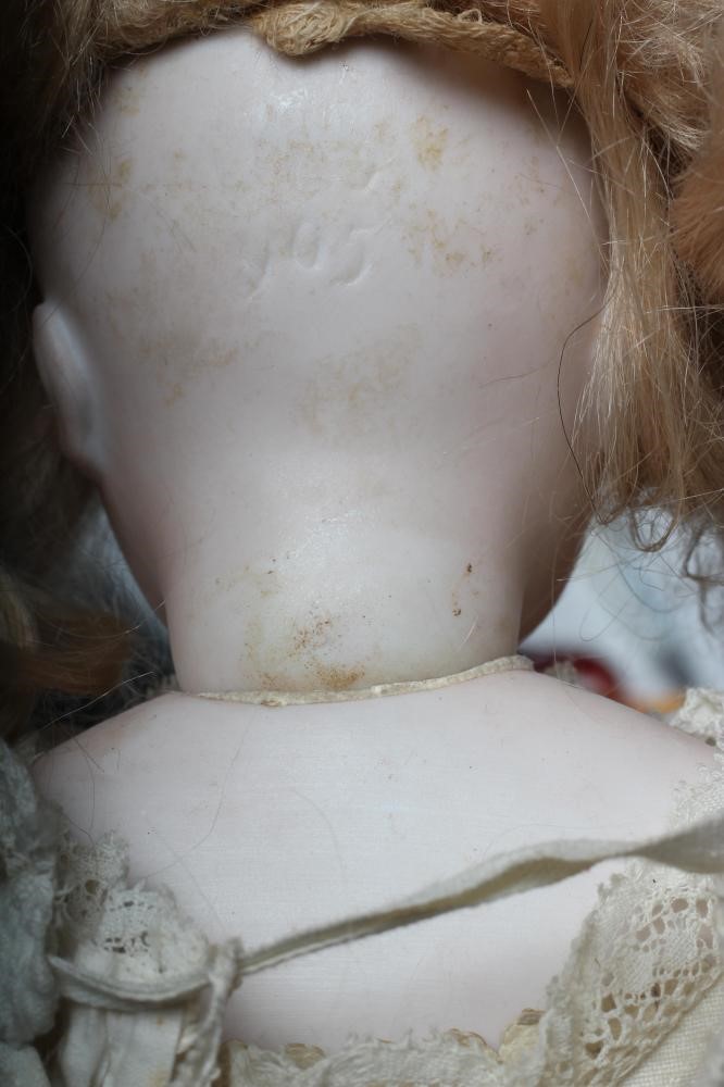 A Simon & Halbig bisque socket head doll Image