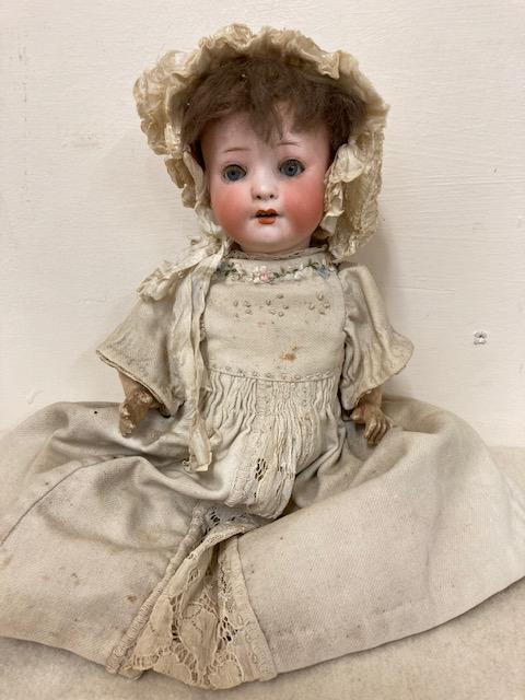 A Heubach Koppelsdorf bisque socket head doll Image