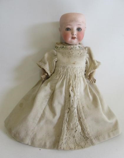 A Heubach Koppelsdorf bisque socket head doll Image