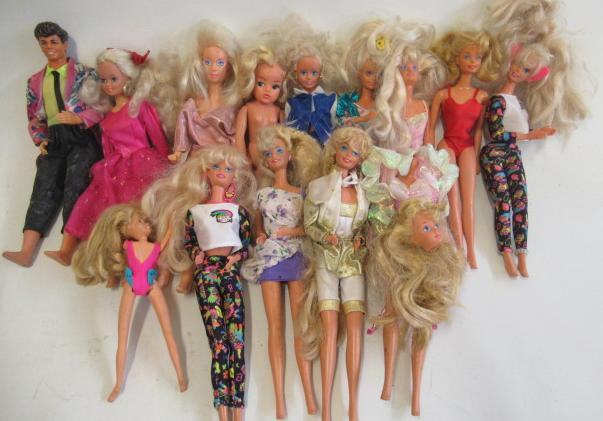 A Collection of Barbie dolls Image