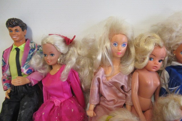 A Collection of Barbie dolls Image