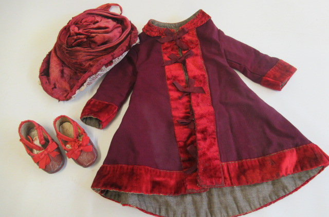 A set of Victorian Dolls clothing originally from a 28" Jumeau doll Image